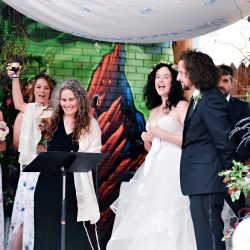 Niven Fairmain RebeccaMariePhotography RMP5008 big - Don't miss the floral dresses, colorful art, and live band at this adorable Colorado wedding Don't miss the floral dresses, colorful art, and live band at this adorable Colorado wedding
