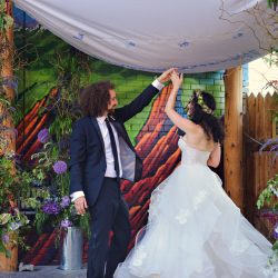 Niven Fairmain RebeccaMariePhotography RMP5736 big - Don't miss the floral dresses, colorful art, and live band at this adorable Colorado wedding Don't miss the floral dresses, colorful art, and live band at this adorable Colorado wedding