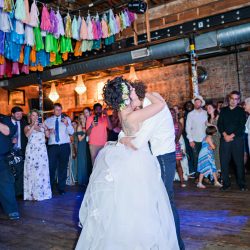 Niven Fairmain RebeccaMariePhotography RMP5946 big - Don't miss the floral dresses, colorful art, and live band at this adorable Colorado wedding Don't miss the floral dresses, colorful art, and live band at this adorable Colorado wedding
