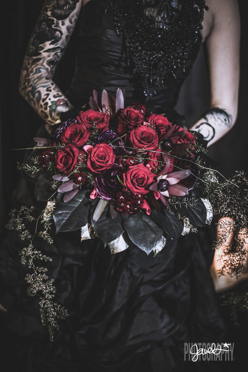 Goth gone LUXE with sparkle, faux fur, and rich reds at this goth wedding inspiration
