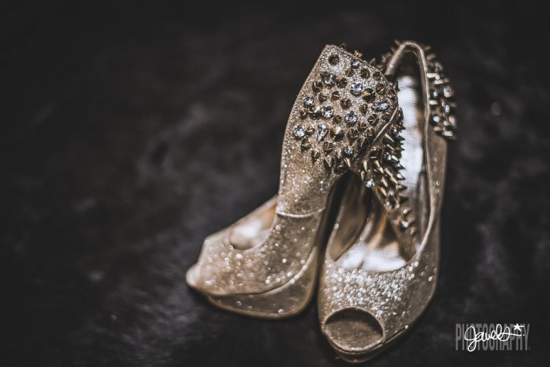 Goth gone LUXE with sparkle, faux fur, and rich reds at this goth wedding inspiration