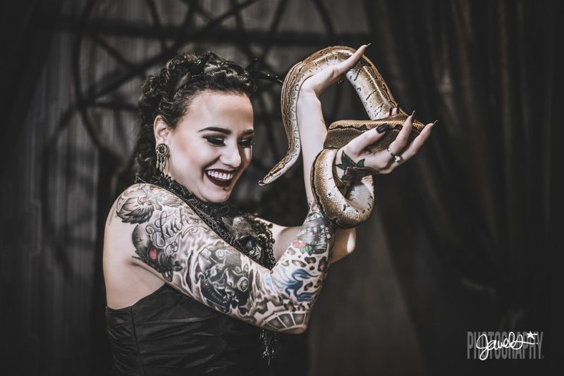 Goth gone LUXE with sparkle, faux fur, and rich reds at this goth wedding inspiration
