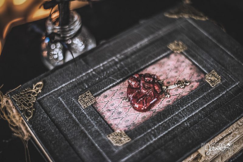 Goth gone LUXE with sparkle, faux fur, and rich reds at this goth wedding inspiration