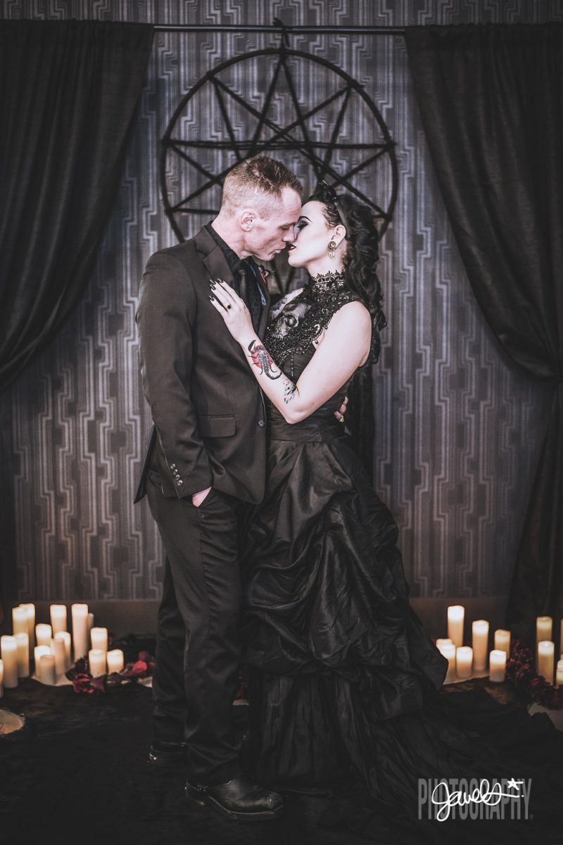 Goth gone LUXE with sparkle, faux fur, and rich reds at this goth wedding inspiration