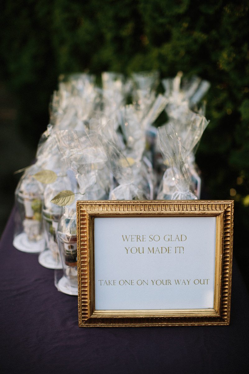 A backyard garden party wedding with yard games & cocktail recipe cards