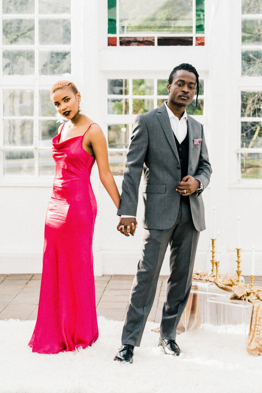 Be blown away by the stunning hot pink dress at this greenhouse elopement shoot
