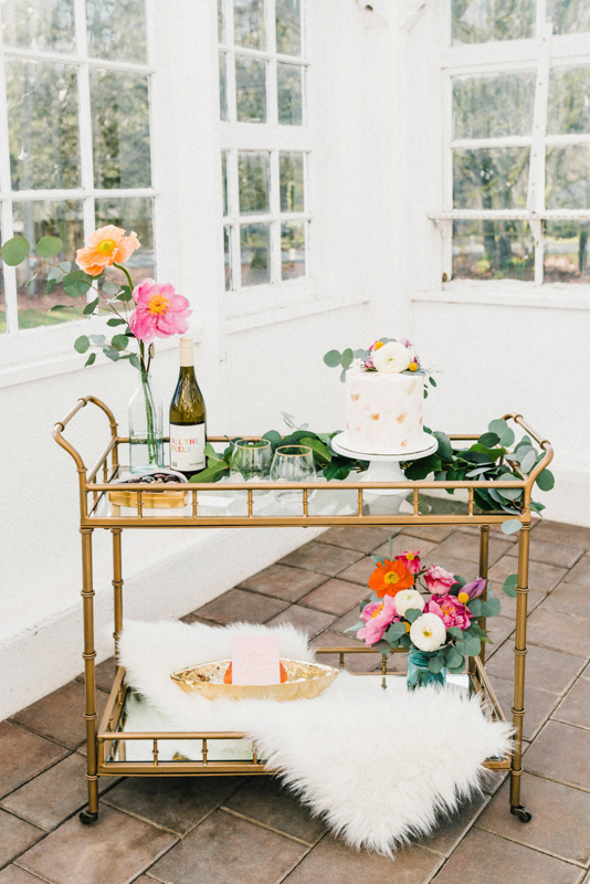 Be blown away by the stunning hot pink dress at this greenhouse elopement shoot