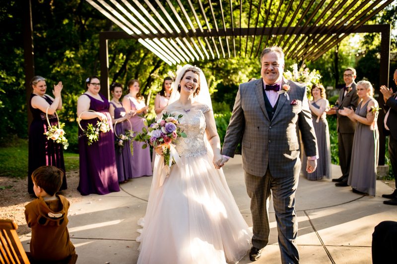 So much magic at this butterfly themed wedding in a sculpture garden