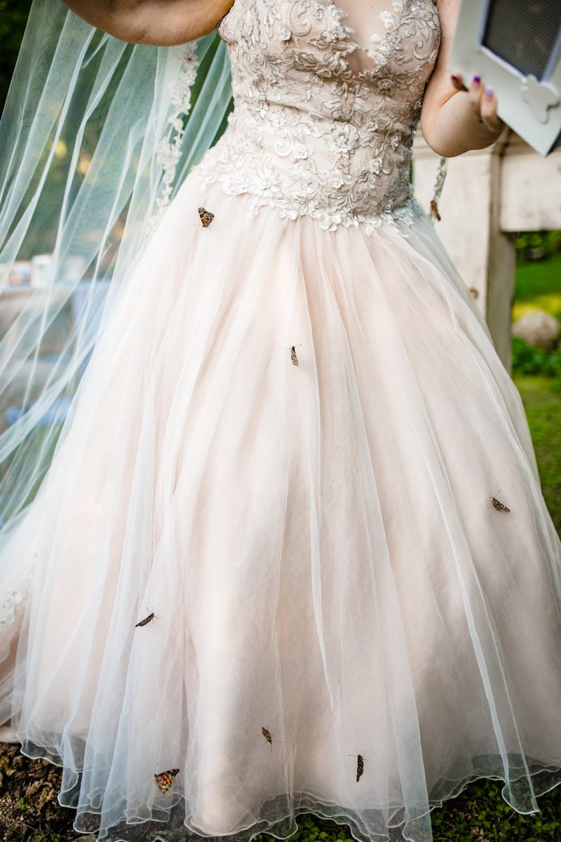 So much magic at this butterfly themed wedding in a sculpture garden