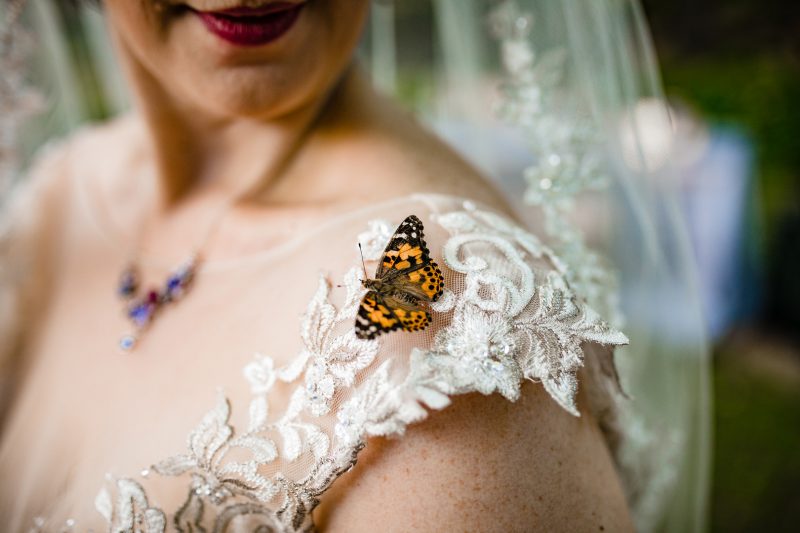 So much magic at this butterfly themed wedding in a sculpture garden