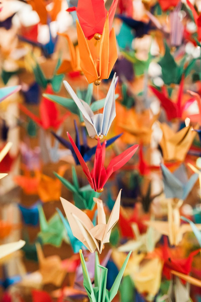 Happily ever campers: this summer camp wedding had a trail mix bar, camp mug favors, and Korean traditions