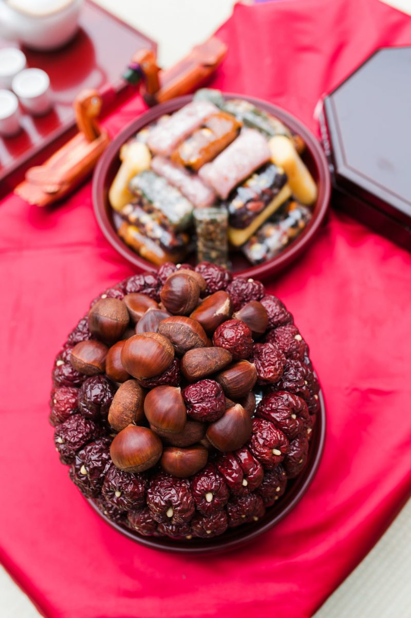 Happily ever campers: this summer camp wedding had a trail mix bar, camp mug favors, and Korean traditions