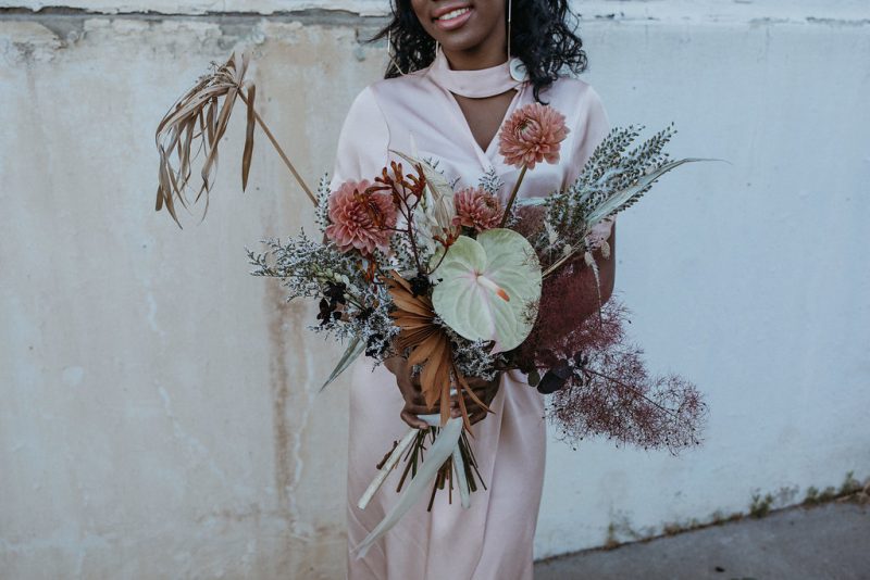 Muted industrial vibes at this tropical engagement inspiration