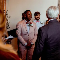 You'll need to fan yourself from the pink suit & striped dress at this romantic brunch wedding