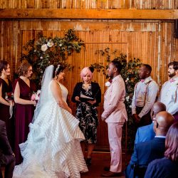 You'll need to fan yourself from the pink suit & striped dress at this romantic brunch wedding
