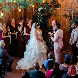You'll need to fan yourself from the pink suit & striped dress at this romantic brunch wedding