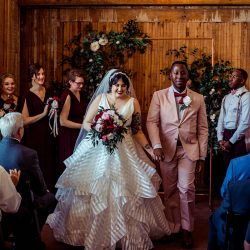 You'll need to fan yourself from the pink suit & striped dress at this romantic brunch wedding
