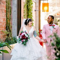 You'll need to fan yourself from the pink suit & striped dress at this romantic brunch wedding