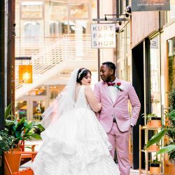 You'll need to fan yourself from the pink suit & striped dress at this romantic brunch wedding