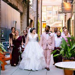 You'll need to fan yourself from the pink suit & striped dress at this romantic brunch wedding
