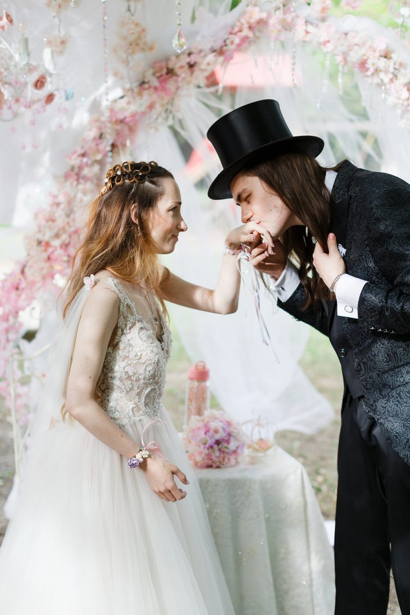 A fairy tale genderfluid cherry blossom vow renewal with a dress-to-suit swap(!)