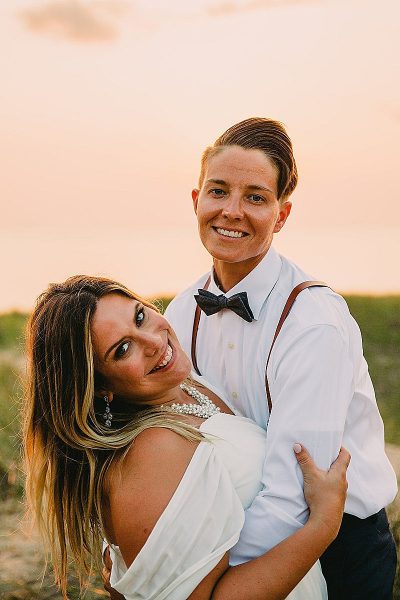 Two ladies, air plants, and Dr. Seuss at this modern boho wedding on Lake Michigan