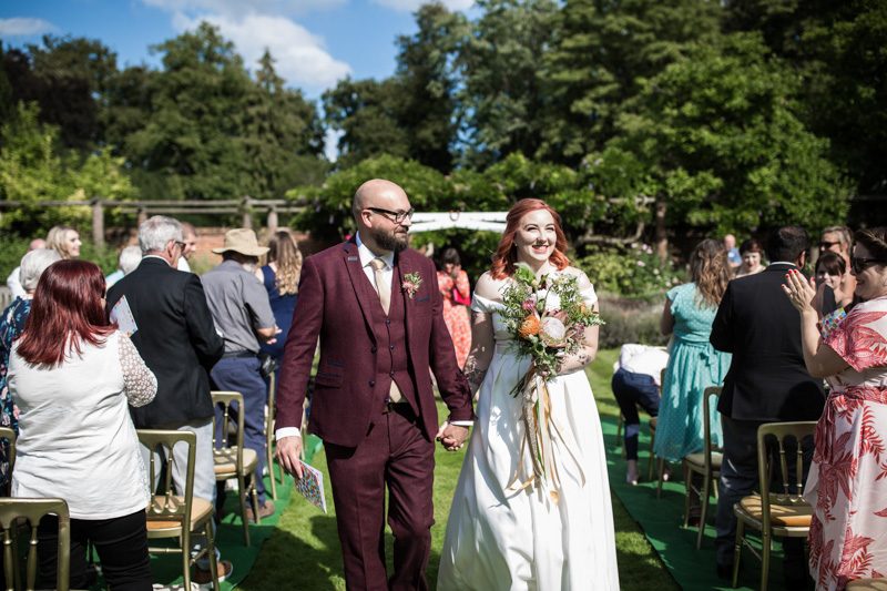 This outdoor carousel wedding had rainbow decor and a doggy bridesmaid