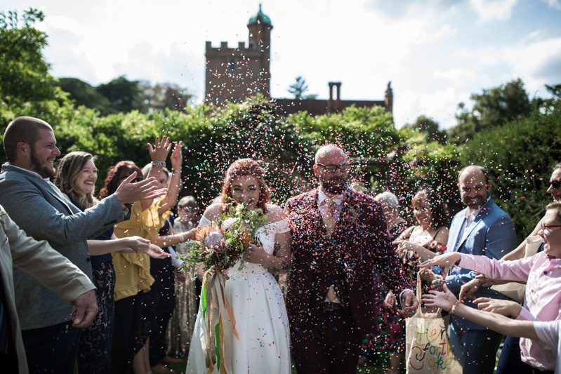 This outdoor carousel wedding had rainbow decor and a doggy bridesmaid