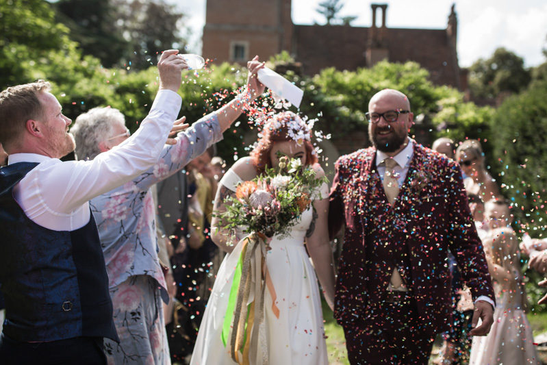 This outdoor carousel wedding had rainbow decor and a doggy bridesmaid
