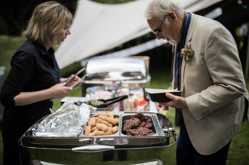 This outdoor carousel wedding had rainbow decor and a doggy bridesmaid