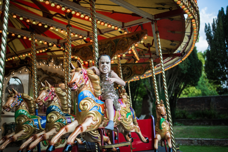 This outdoor carousel wedding had rainbow decor and a doggy bridesmaid