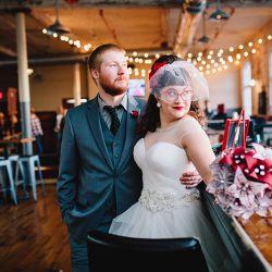 It's guitars & malt shop love at this retro diner-themed wedding