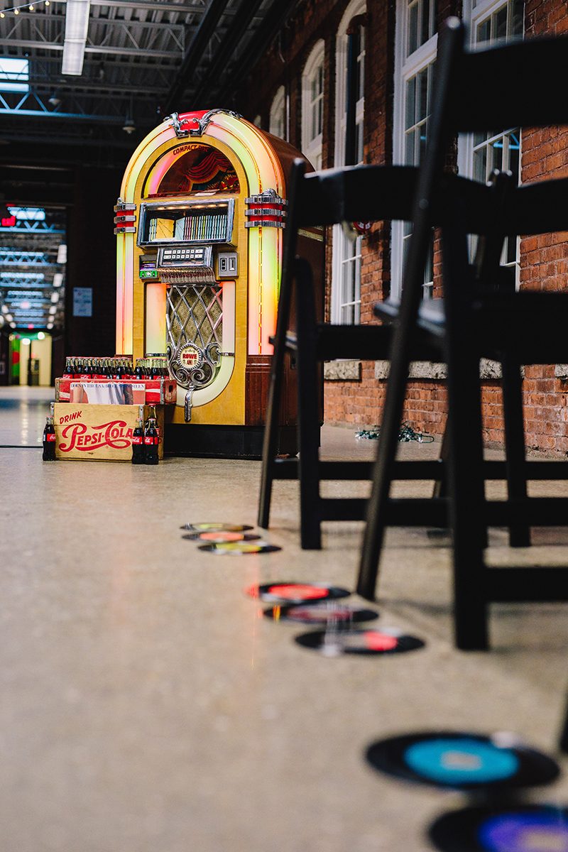 It's guitars & malt shop love at this retro diner-themed wedding