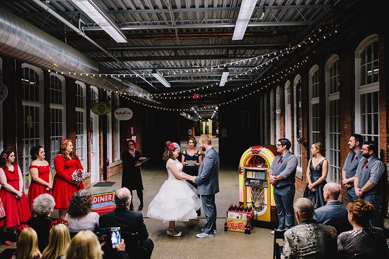 It's guitars & malt shop love at this retro diner-themed wedding