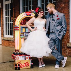 It's guitars & malt shop love at this retro diner-themed wedding