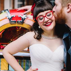 It's guitars & malt shop love at this retro diner-themed wedding