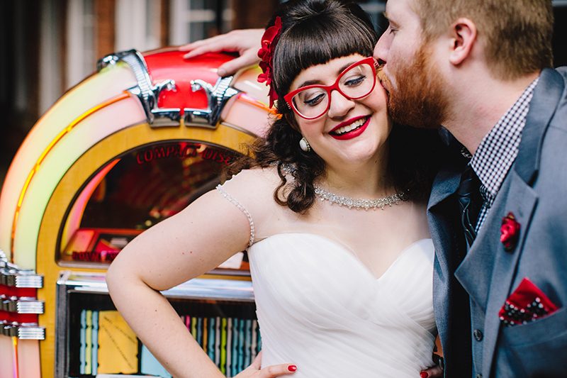 It's guitars & malt shop love at this retro diner-themed wedding