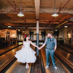 It's guitars & malt shop love at this retro diner-themed wedding