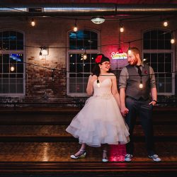 It's guitars & malt shop love at this retro diner-themed wedding