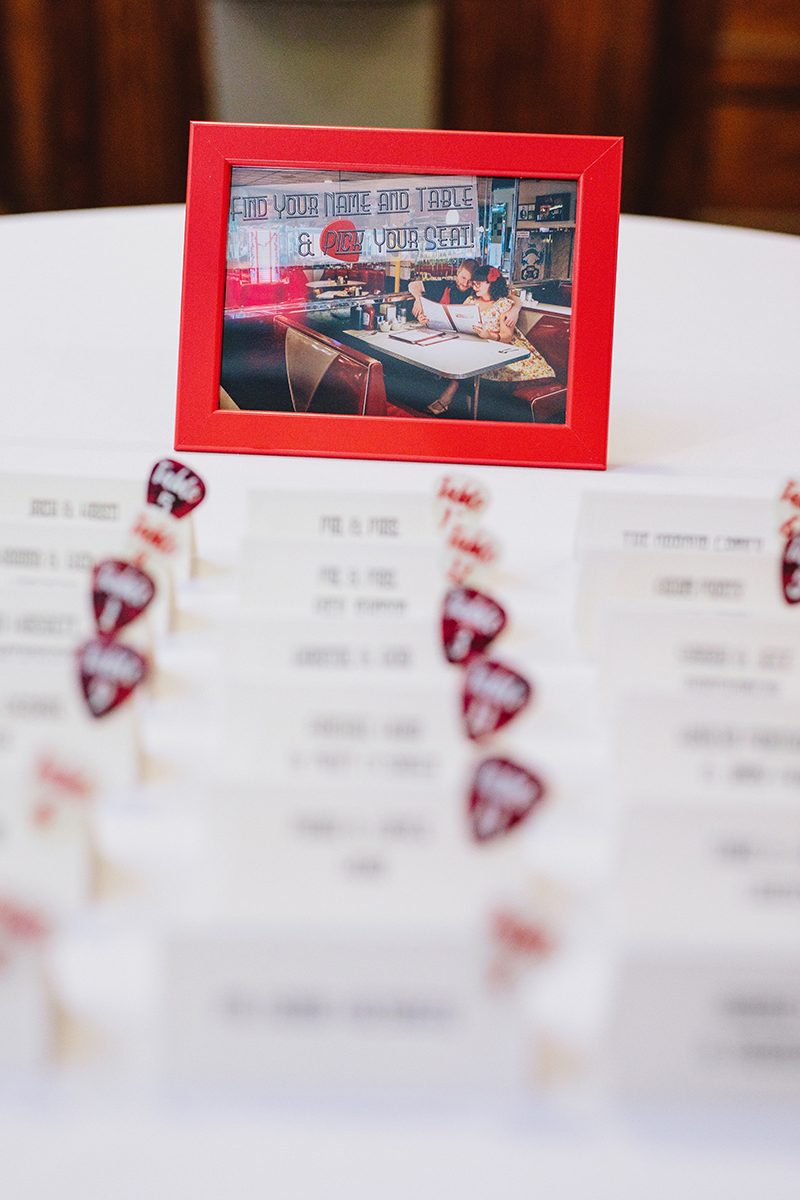 It's guitars & malt shop love at this retro diner-themed wedding