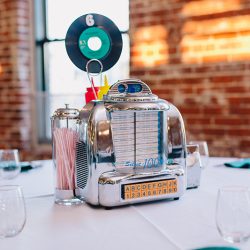 It's guitars & malt shop love at this retro diner-themed wedding