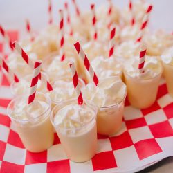 It's guitars & malt shop love at this retro diner-themed wedding