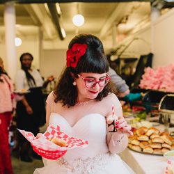 It's guitars & malt shop love at this retro diner-themed wedding