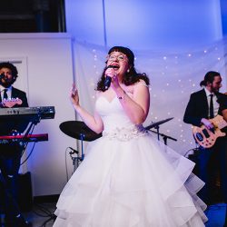 It's guitars & malt shop love at this retro diner-themed wedding