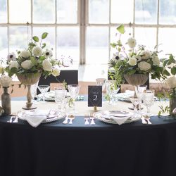 Industrial chic vibes at this vintage-inspired two-groom wedding inspiration