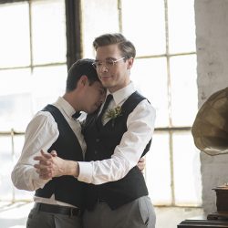 Industrial chic vibes at this vintage-inspired two-groom wedding inspiration