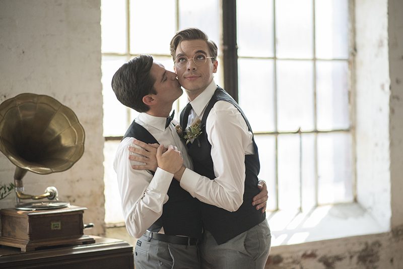 Industrial chic vibes at this vintage-inspired two-groom wedding inspiration