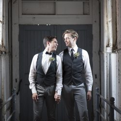 Industrial chic vibes at this vintage-inspired two-groom wedding inspiration