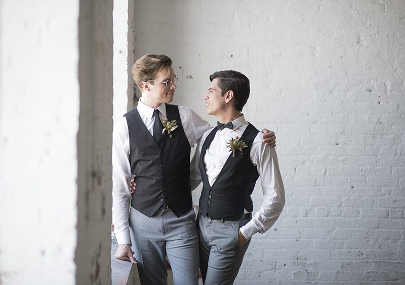 Industrial chic vibes at this vintage-inspired two-groom wedding inspiration