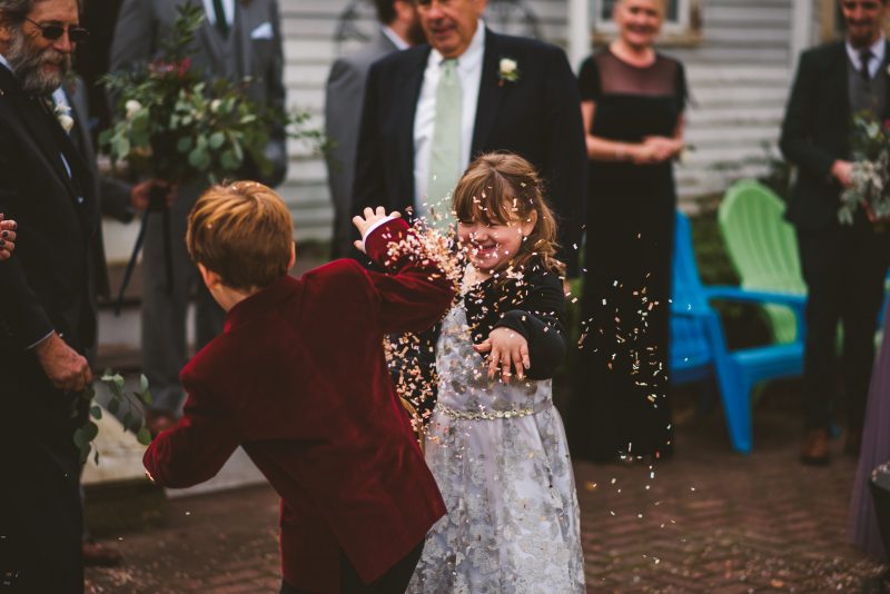A backyard wedding with dinosaurs, DIY, & a gorgeous gown made by the bride